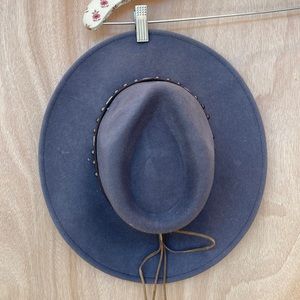 Western wide brim hat with leather belt